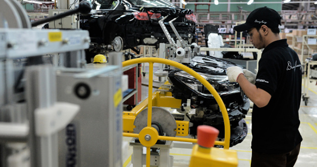 Ilsutrasi investasi perusahaan otomotif BMW. (Dimas Ardian/Bloomberg)