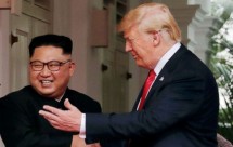 Presiden AS Donald Trump dan pemimpin Korea Utara Kim Jong-un di Singapura (FotoDok Industry.co.id))