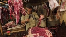 Ilustrasi pedagang daging. (Rony Zakaria/Bloomberg)