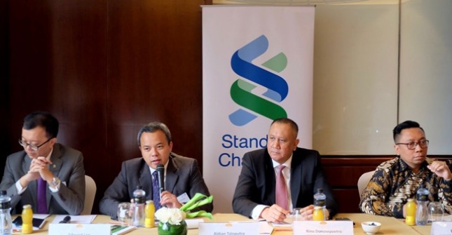 Standard Chartered Bank memprediksikan tahun ini pertumbuhan ekonomi Indonesia akan tembus 5,2 persen. 