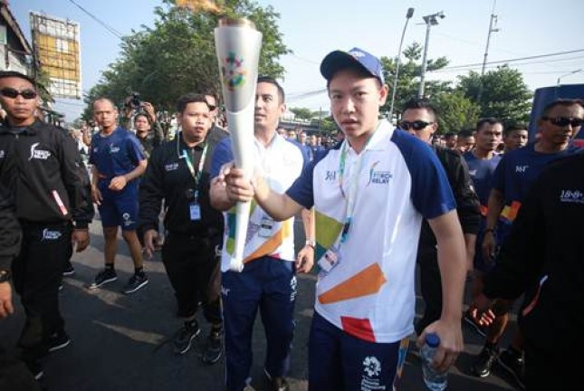 Moriano Utomo saat membawa api obor Asian Games 2018 (Foto: Dok. Industry) 
