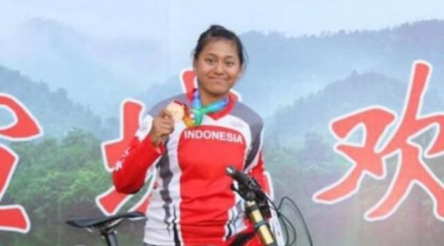 Tiara Andini Prastika menyumbang medali emas di nomor downhill putri. 