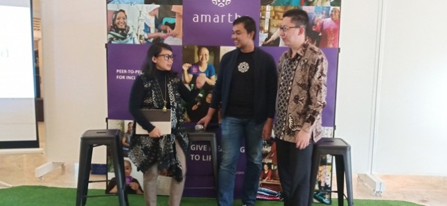 Founder & CEO PT Amartha Mikro Fintek (Amartha), Andi Taufan Garuda Putra (tengah)