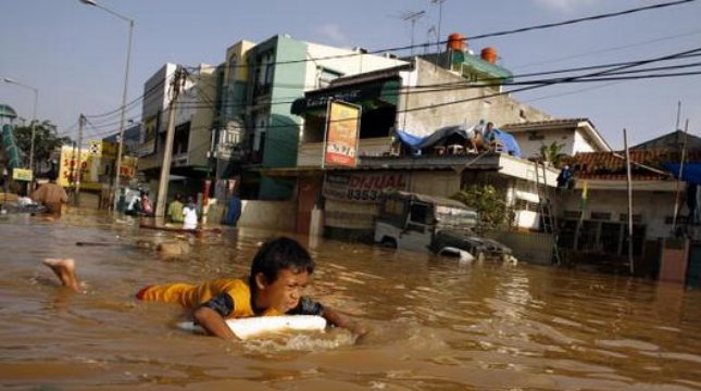 Ilustrasi banjir di Jakarta. (Paula Bronstein/Getty Images)