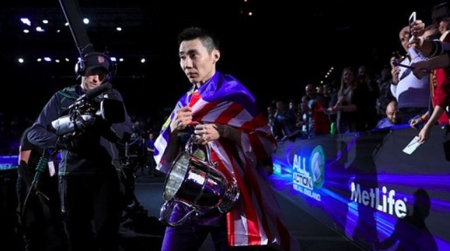 Pebulutangkis Malaysia Chong Wei Lee merayakan kemenangannya di All England, Minggu (12/3/2017). (Tim Goode/PA Images via Getty Images)