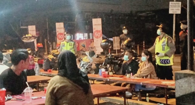 Polisi akan bubarkan masa berkumpul cegah covid -19 (ft-mediaindonesia.com)