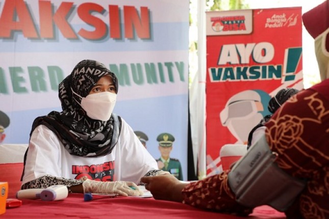 Pelaksanaan vaksinasi menuju 100% desa kekebalan komunal Banjar Sari, Kec. Sukatani, Kabupaten Bekasi