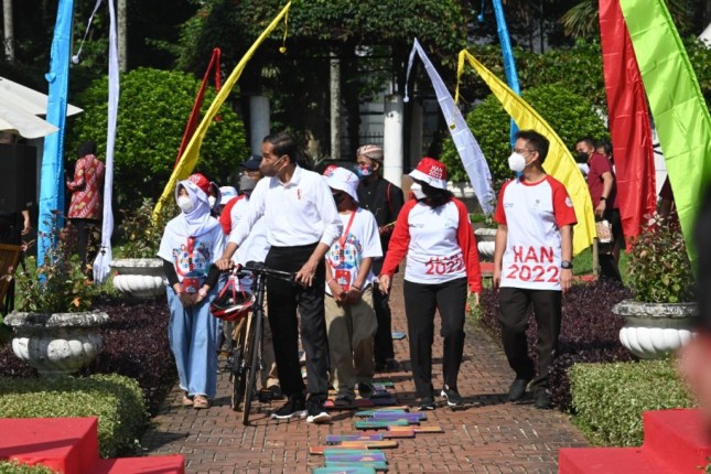 Presiden Jokowi menghadiri Puncak Peringatan Hari Anak Nasional (HAN) tahun 2022 di Taman Teijsmann, Kebun Raya Bogor, Jabar, Sabtu (23/07/2022). (Foto: Humas Setkab/Fitri) 
