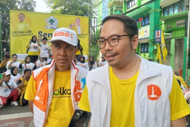 Ketua Panitia Acara “Senam Partai 60LKAR” sekaligus Bendahara DPD Partai GOLKAR Jakarta Barat, H. Suharto bersama Ketua DPD Partai GOLKAR Jakarta Barat, M. Richard Moertidjaya