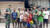 Satgas Yonif 754 Kostrad Laksanakan Pelayanan
