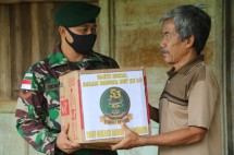 Satgas Pamtas RI-PNG Yonif MR 411/Pdw Kostrad Melaksanakan Kegiatan Bertema Jumat Berkah