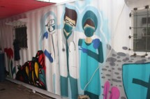 Laboratorium PCR Kontainer Bermural yang Menggambarkan Harus Bersatu Lawan Covid-19