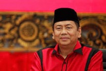 Dr. Kapitra Ampera SH MH